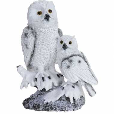 Baby kerstbeeldje sneeuwuil kindje boomstam type speelgoed