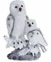 Baby kerstbeeldje sneeuwuil kindje boomstam type speelgoed 10138238